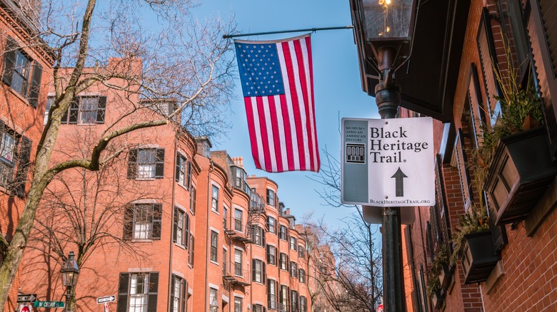 Black Heritage Trail sign U.S. flag