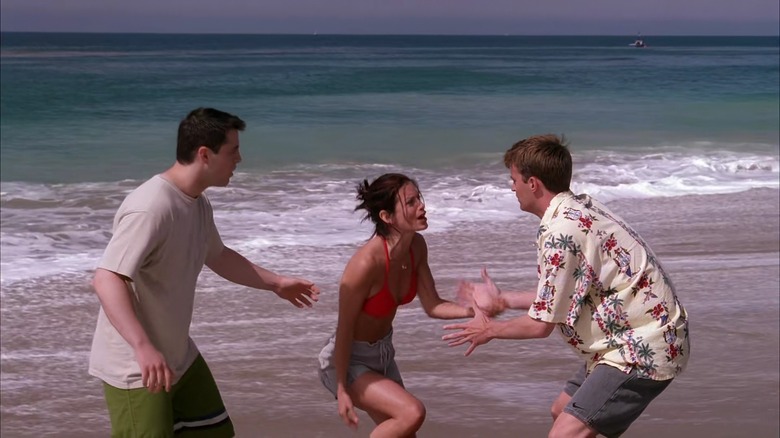 Joey, Monica, and Chandler on a beach