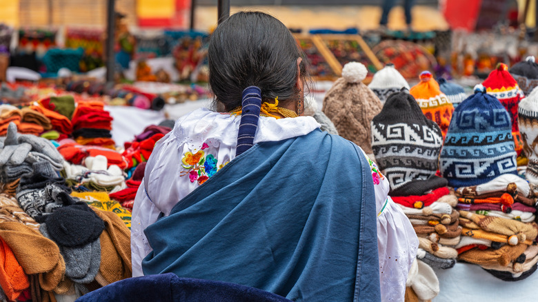 Vendor at Otavalo market