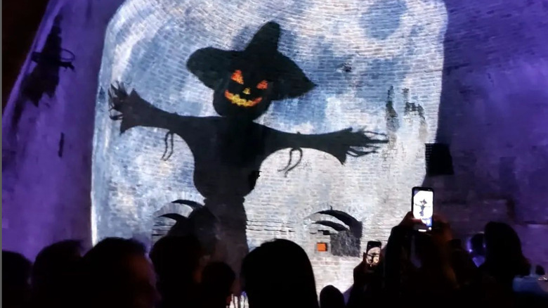 Pumpkin scarecrow projection in Corinaldo