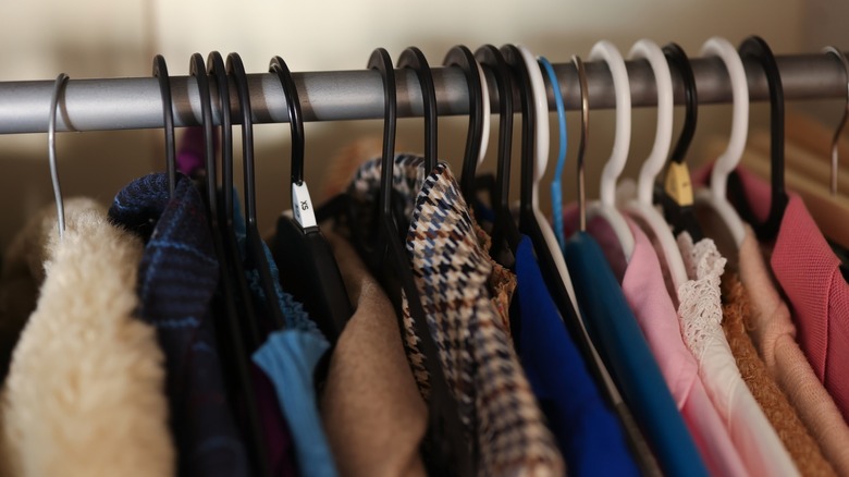 closeup of clothes on hangers