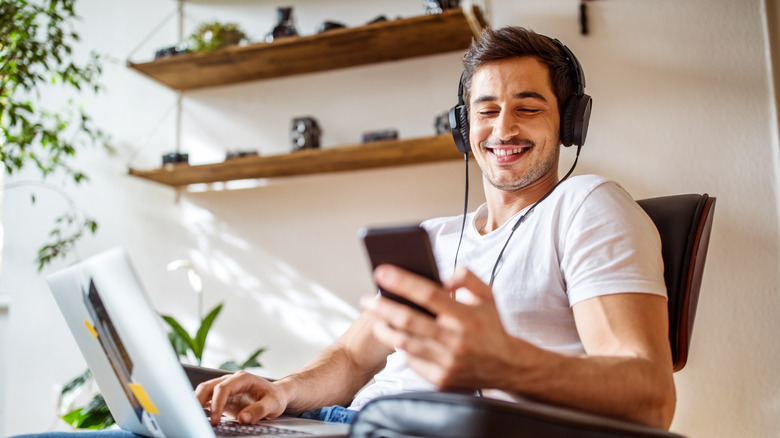 man watching video on phone