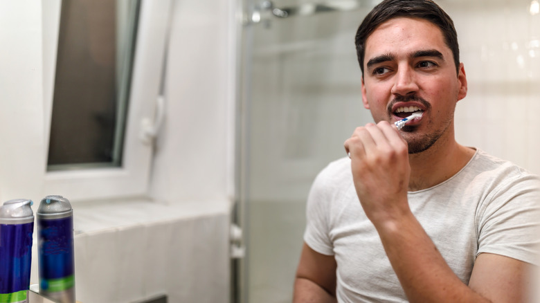 Man brushing his teeth