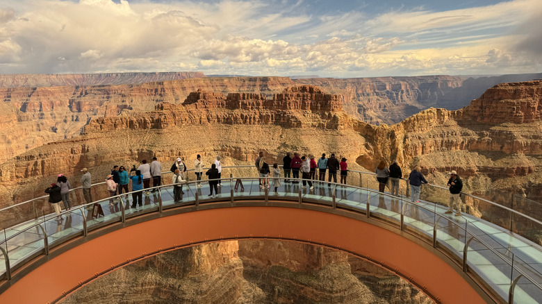 Tourists on the glass-bottomed bridge at the Grand Canyon.