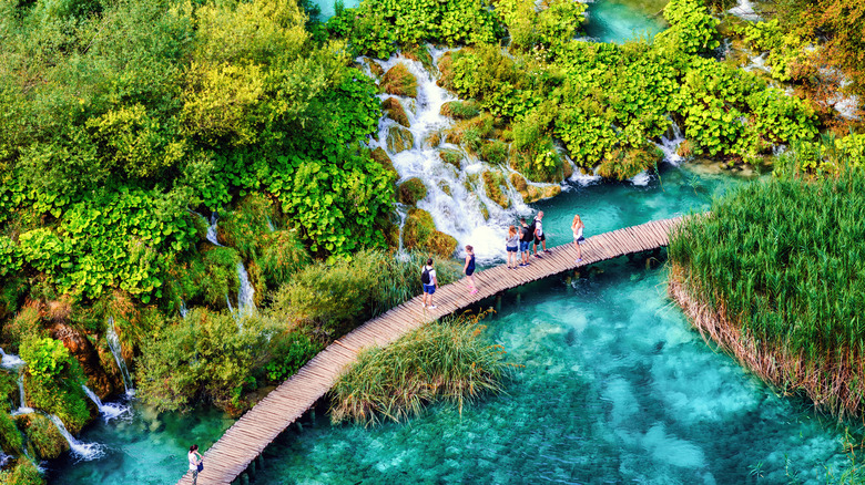 tourists exploring Plitvice Lakes