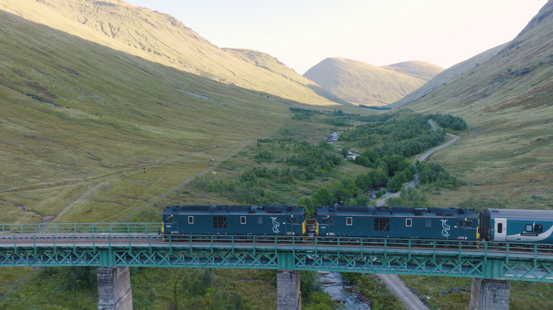 Caledonian Sleeper Train crossing a valley