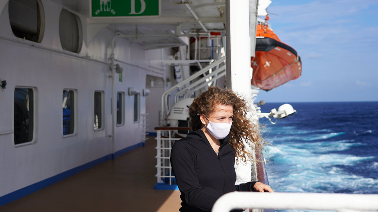 woman wearing mask on cruise
