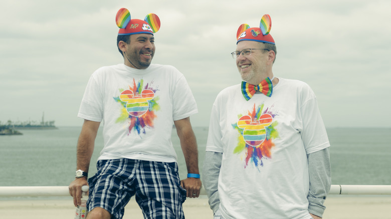 People wearing rainbow ears