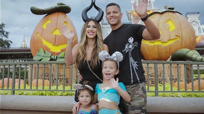 Family taking photo at Mickey's Not-So-Scary Halloween Party