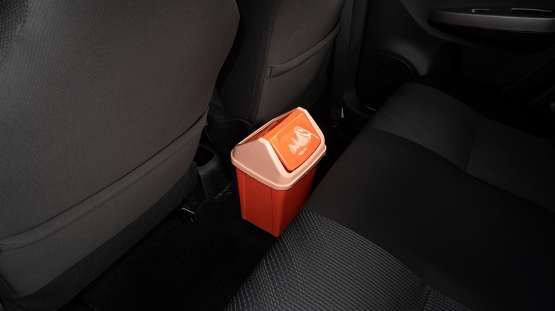 tiny trash can in car