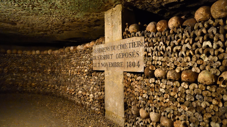 Bones piled in Paris Catacombs