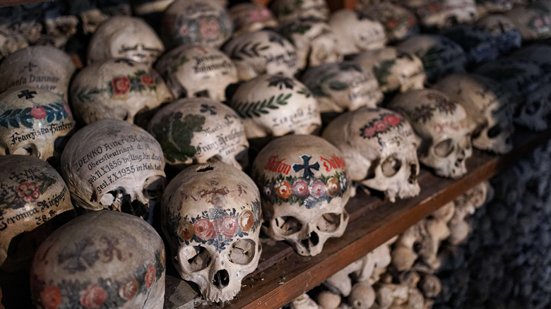 Painted skulls at Hallstatt Ossuary