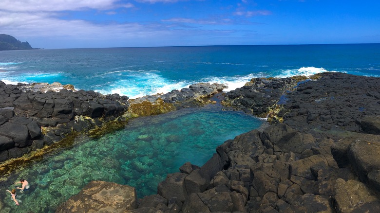 The aquamarine waters of the Queen's Bath, Kauai, Hawaii