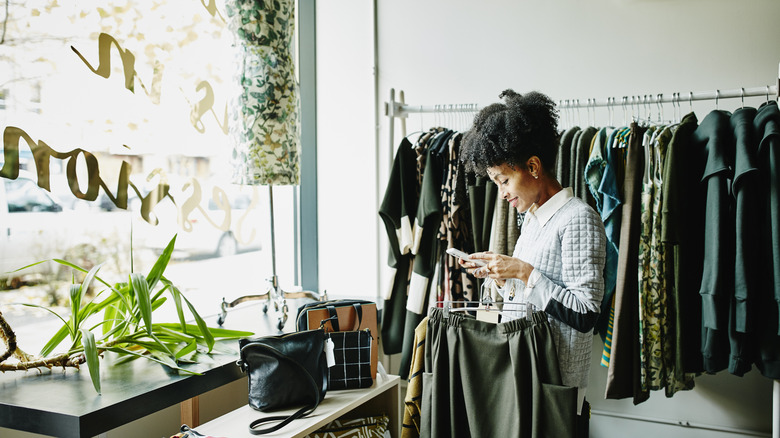 woman shopping smiling boutique