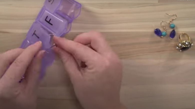 Packing jewelry in a pill container