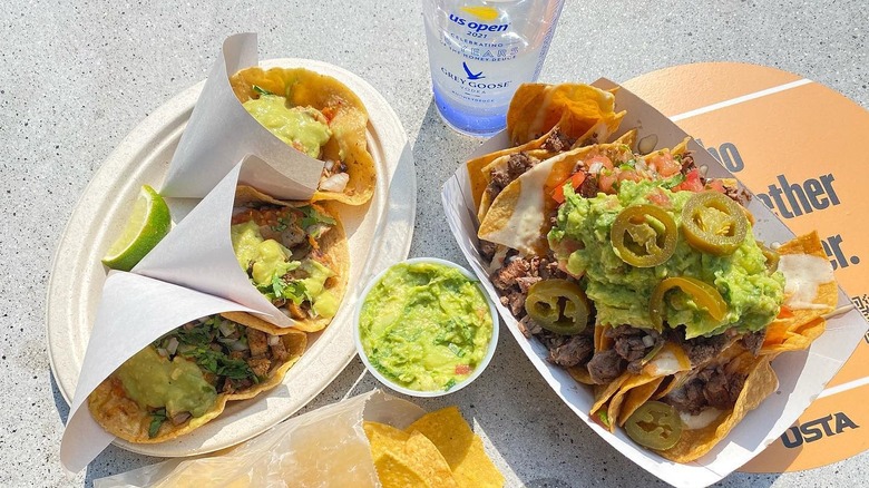 Tortas and tacos with water and guacamole