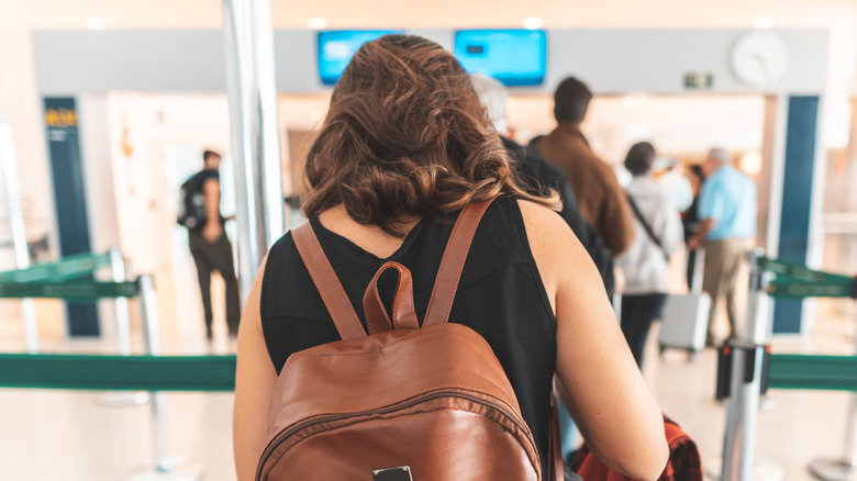 woman in airport security line