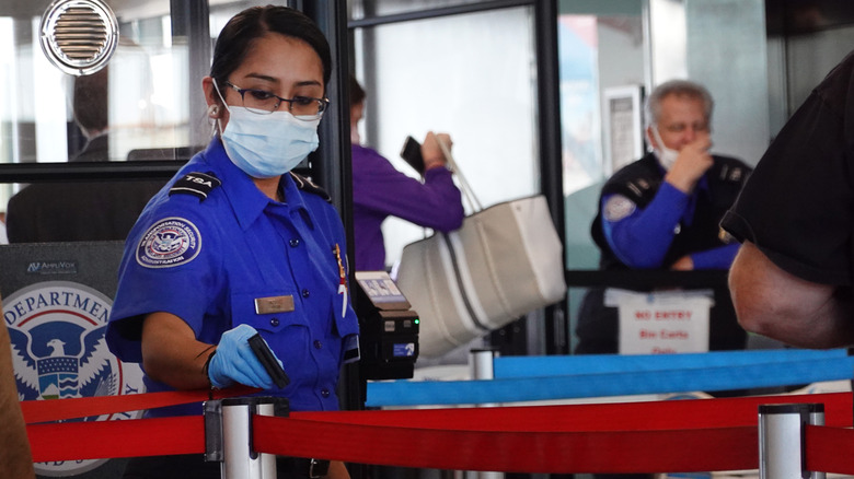 TSA workers in airport