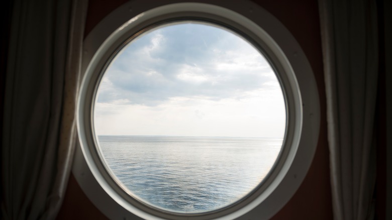 cruise ship window with horizon