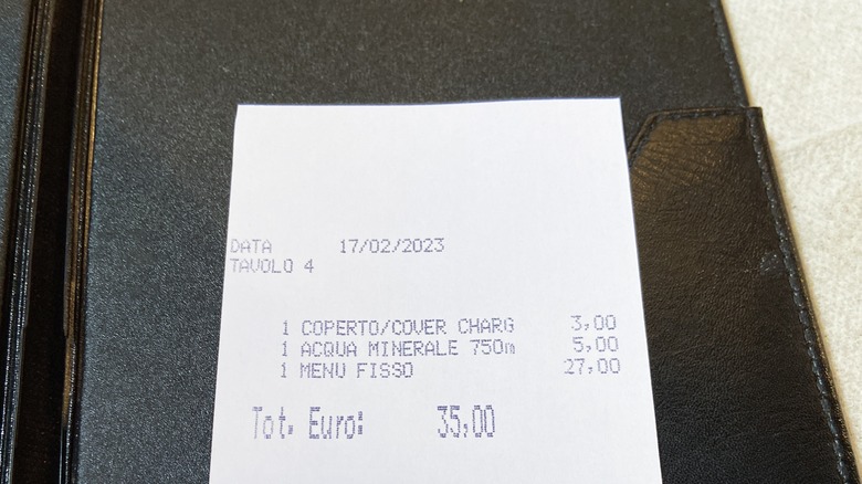 Restaurant bill with coperto