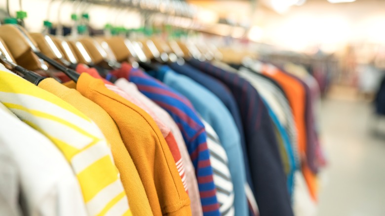 Clothes hanging in a store