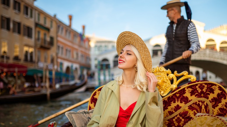 Woman on gondola ride, Venice