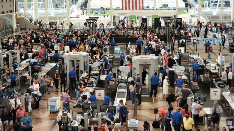 busy security checkpoint in airport