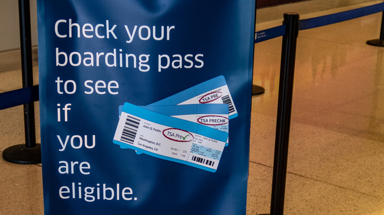 Sign explaining TSA PreCheck pass