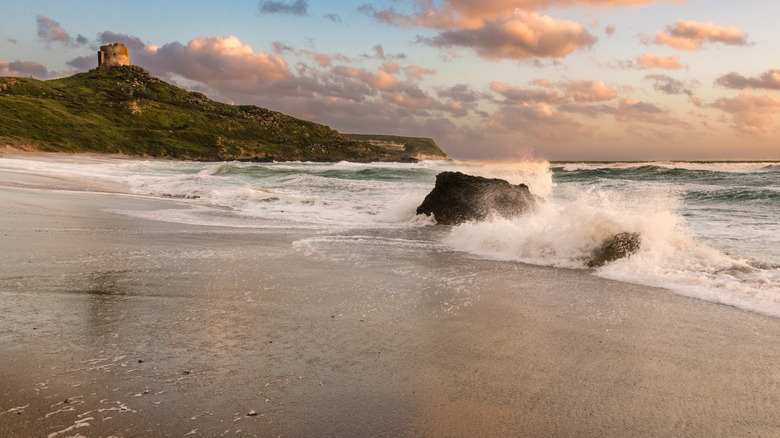 Sardinia beach with tower