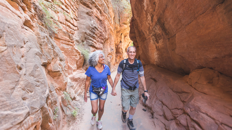 Couple hiking through rock formations
