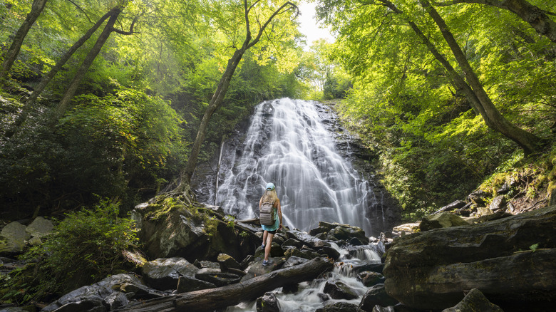 Hiker in front of Crabtree Falls, North Carolina