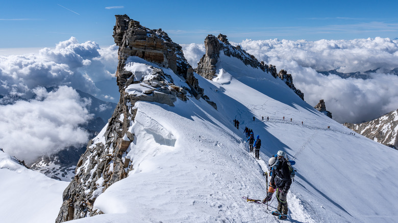 Climbers on a snowy mountain