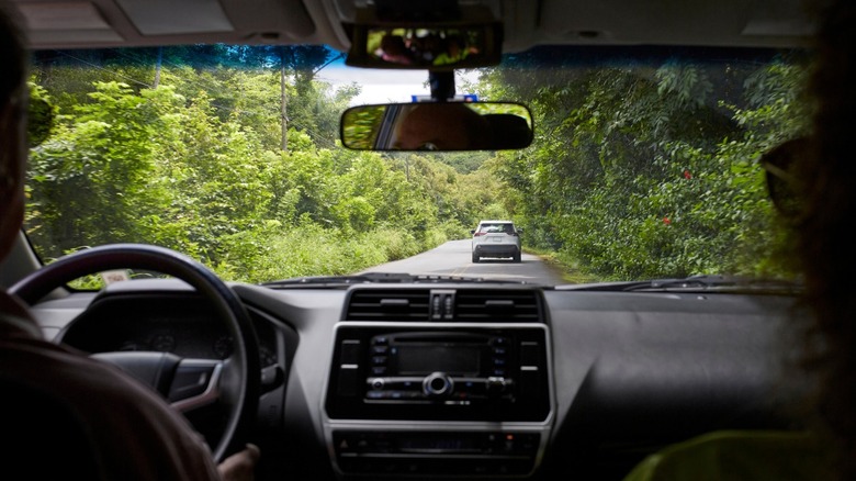 People in a car on a costa rica road trip