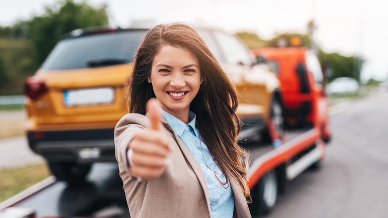 person happy to receive roadside assistance