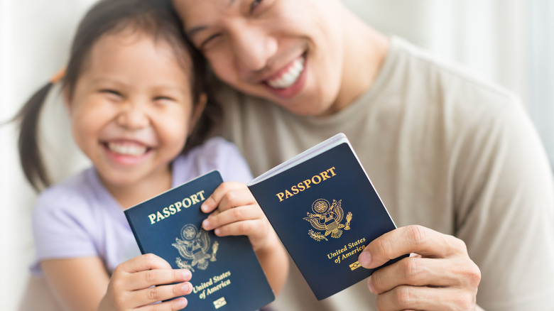 parent and child with passports