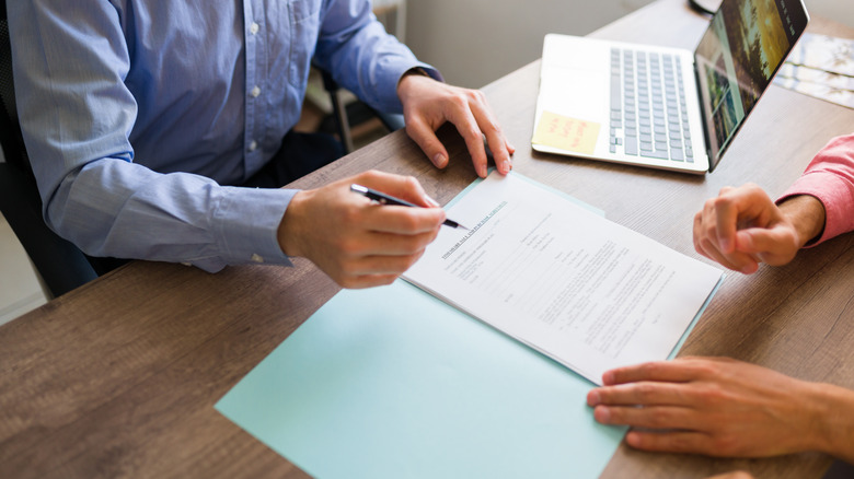 couple signing an agreement 