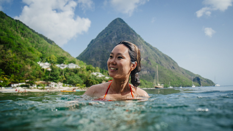 Traveler swimming in the Caribbean