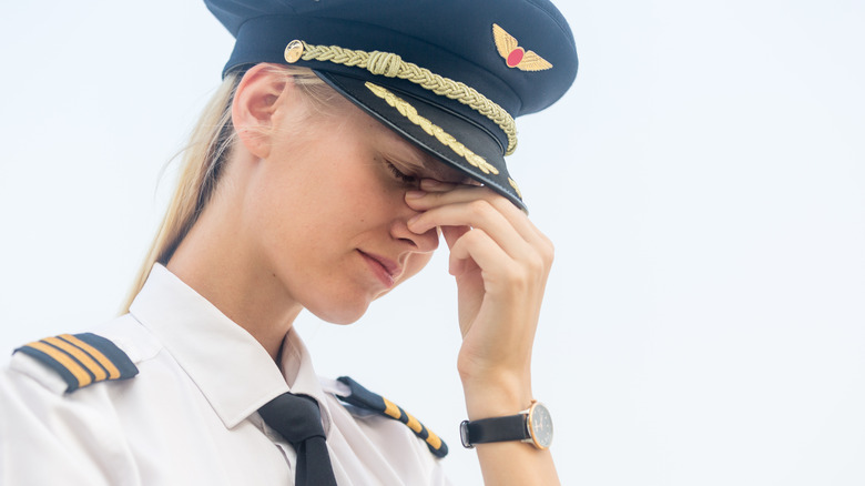 Female airline pilot fatigued