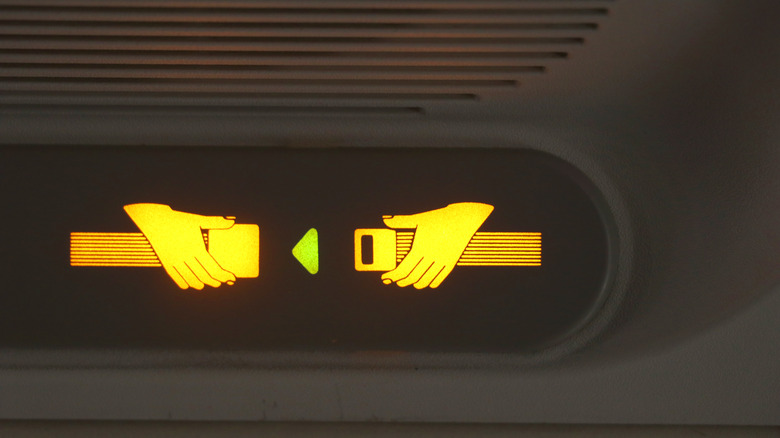 Seat belt sign on plane