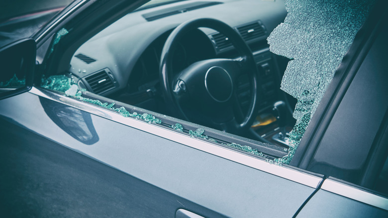 Close-up of a car with broken window