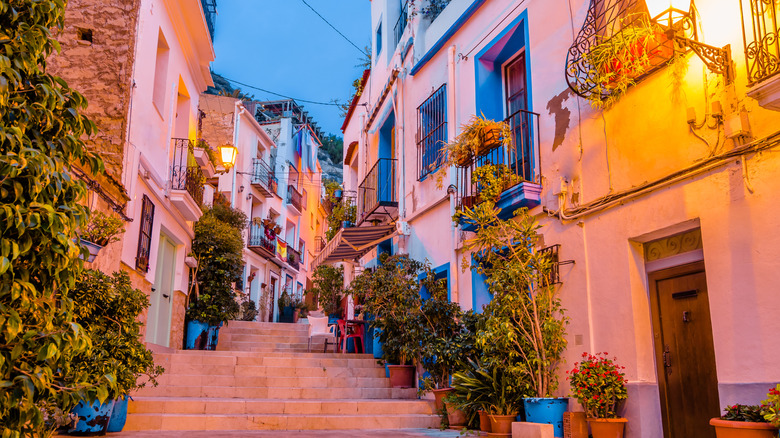 Houses on narrow street in Alicante, Spain