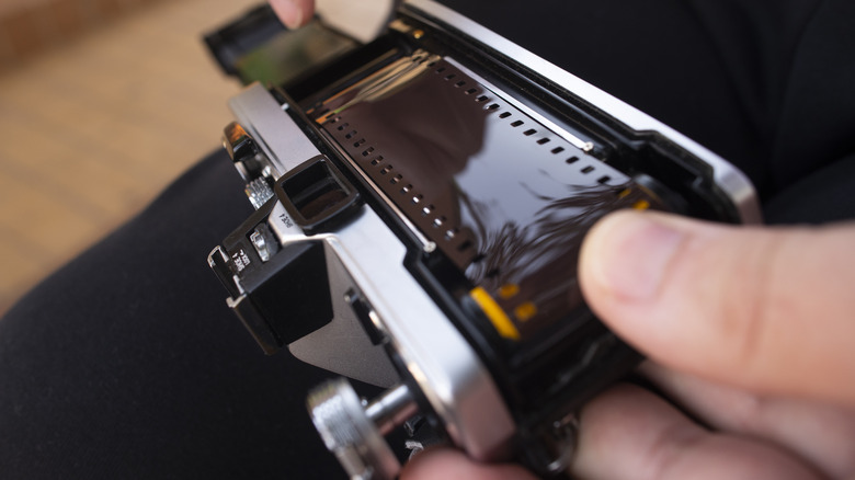 Roll of film going into camera