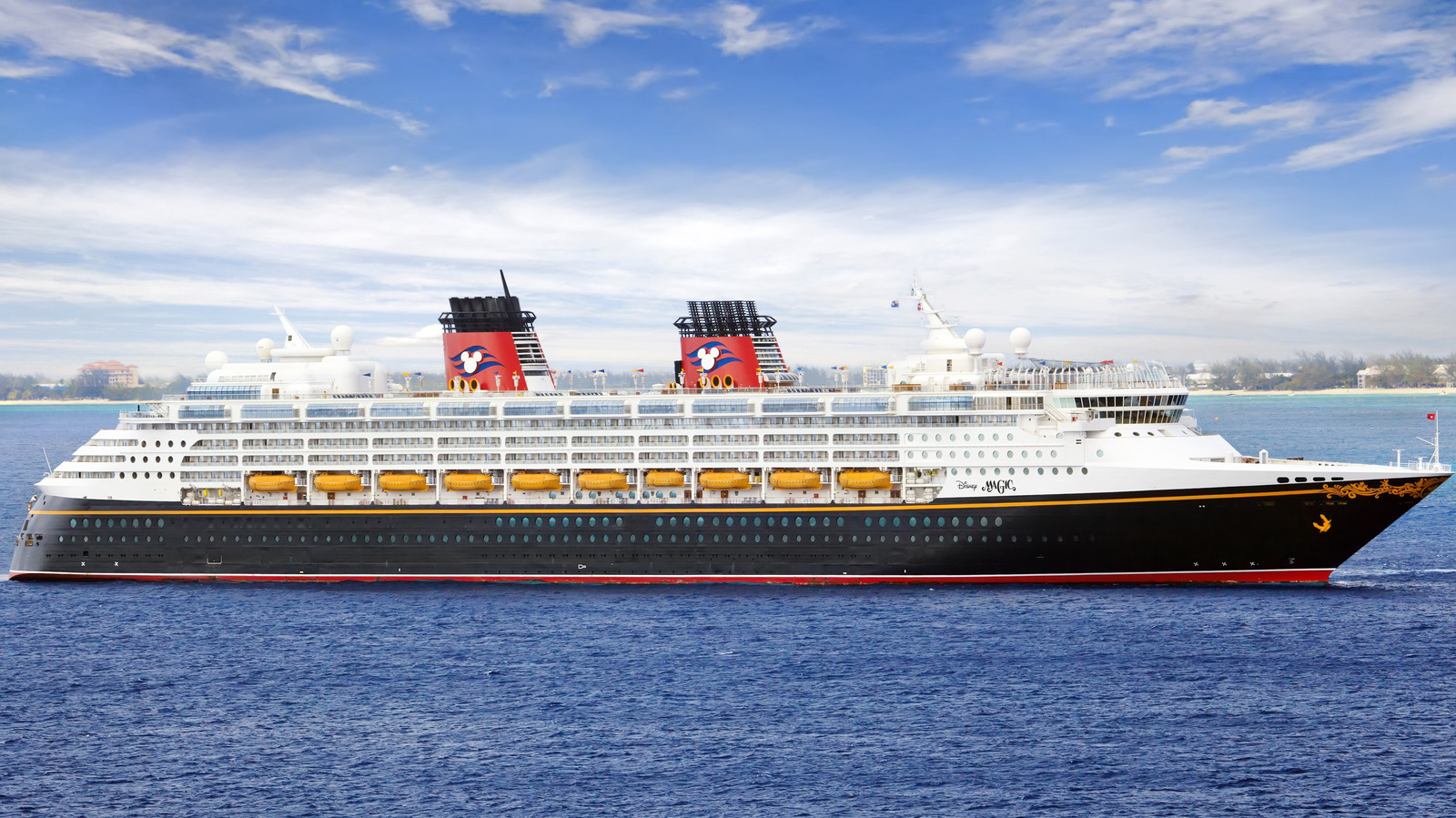 Disney Cruise Ship Moored In An Ocean Background, Disney Cruise Ship  Pictures Background Image And Wallpaper for Free Download