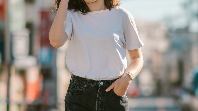 Woman wearing white top