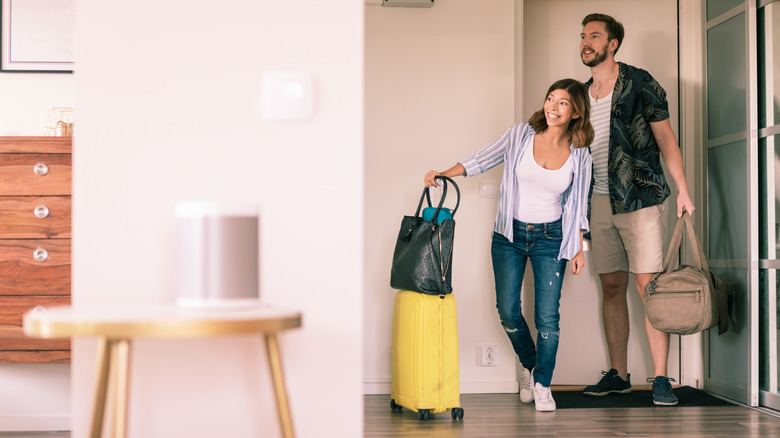 couple with luggage