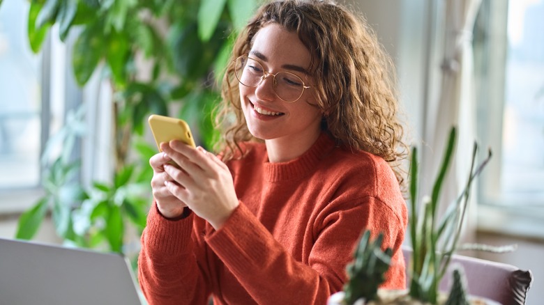 Woman messaging on her phone