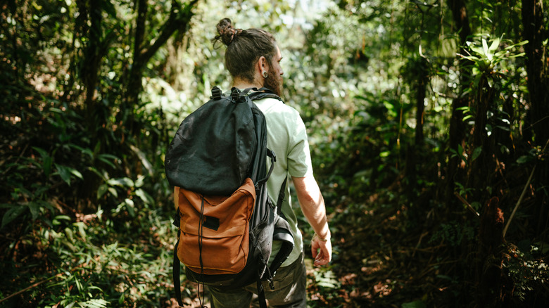 Man hiking in a jungle