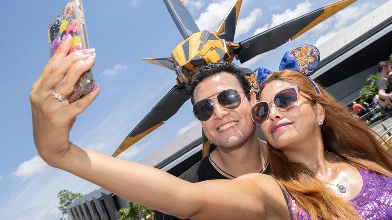 Disney visitors taking a selfie