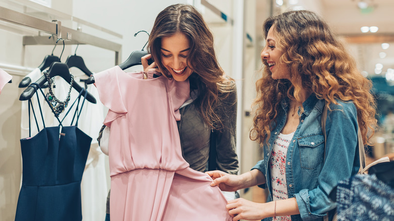 Women shopping for dresses