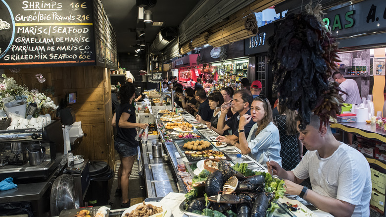 Eating seafood at a Barcelona tapas bar 